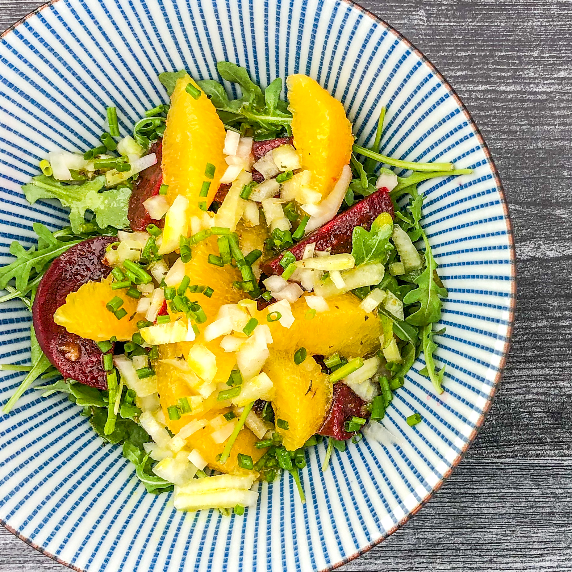 Beets Orange and Arugula in a Salad Bowl