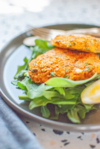 Sweet Potato Fritters on Spinach & Arugula with Olive Oil and Lemon Dressing