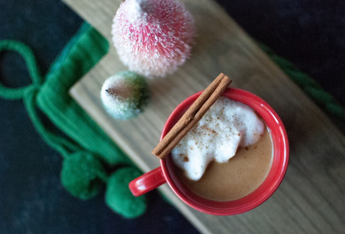 A festive mug of hot buttered rum.